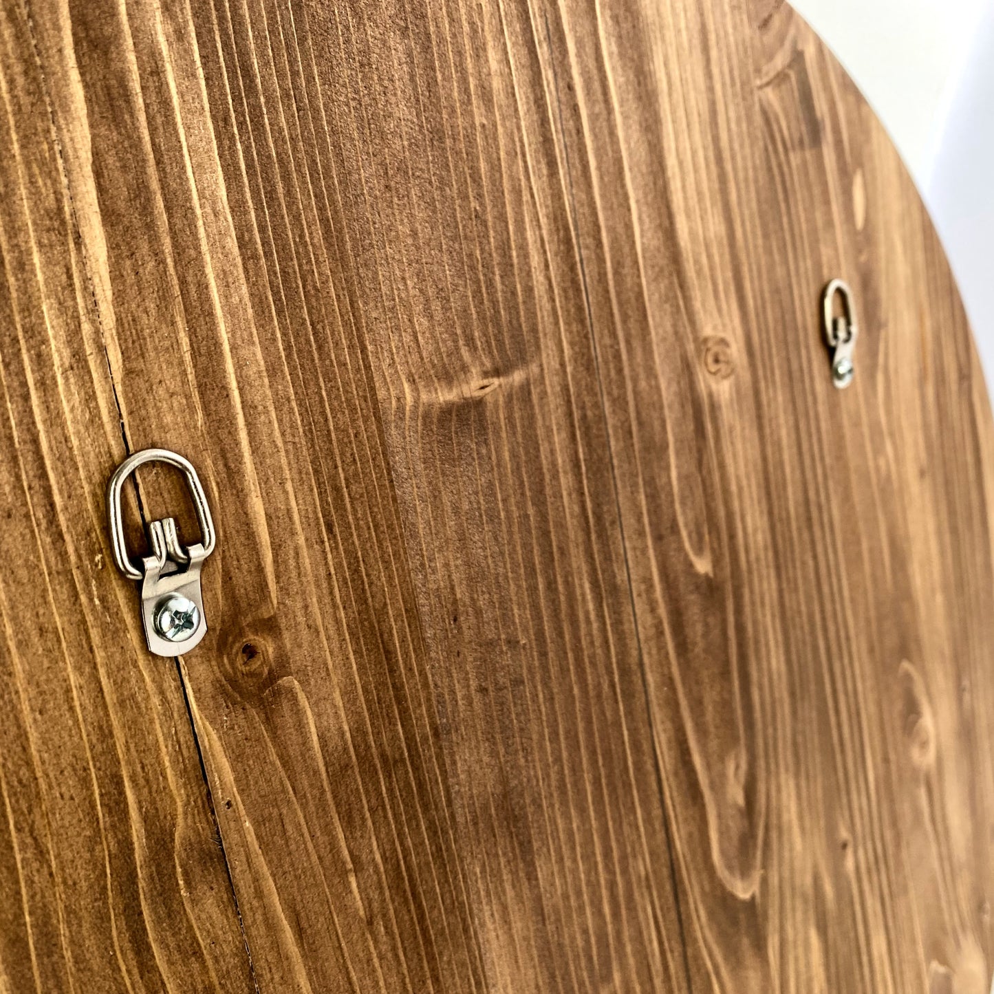 Back view of the sign to show the 2 d-ring hanging hooks included for easy hanging.