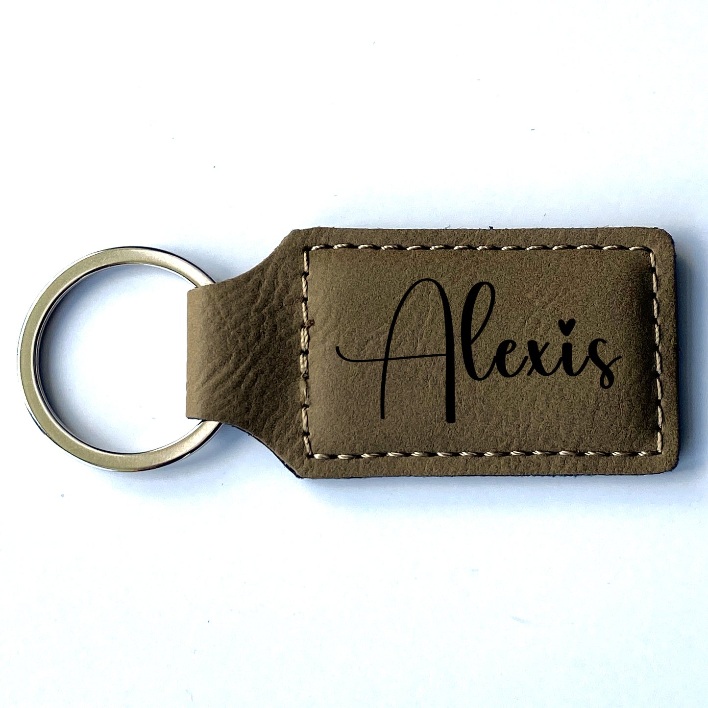 Buckskin faux leather keychain with customized name. 