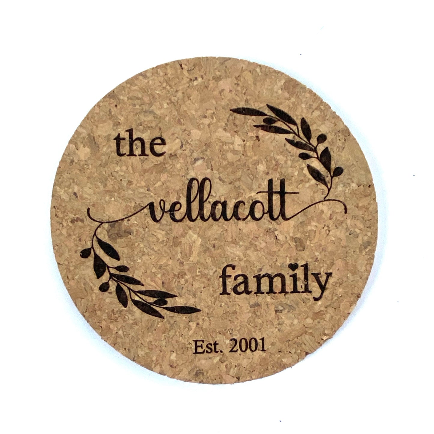 Elegant 4 inch round cork coaster custom engraved with family name and wedding or special date using our Olive Leaf Design.  