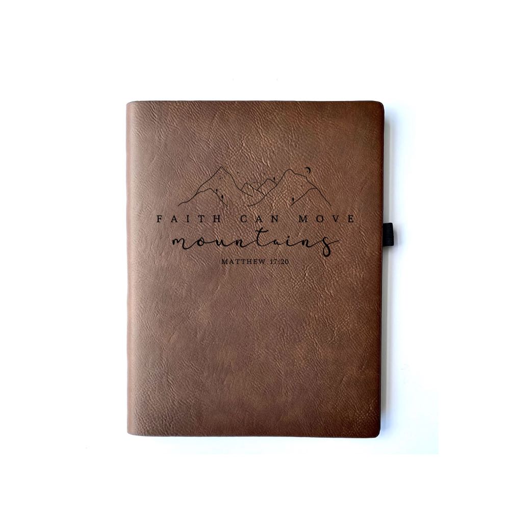 Bay Brown Faux leather journal with "Faith Can Move Mountains Matthew 17:20" engraved on it. Can be personalized with your name or business logo in the bottom right corner. A matching pen can be engraved to complete the set.