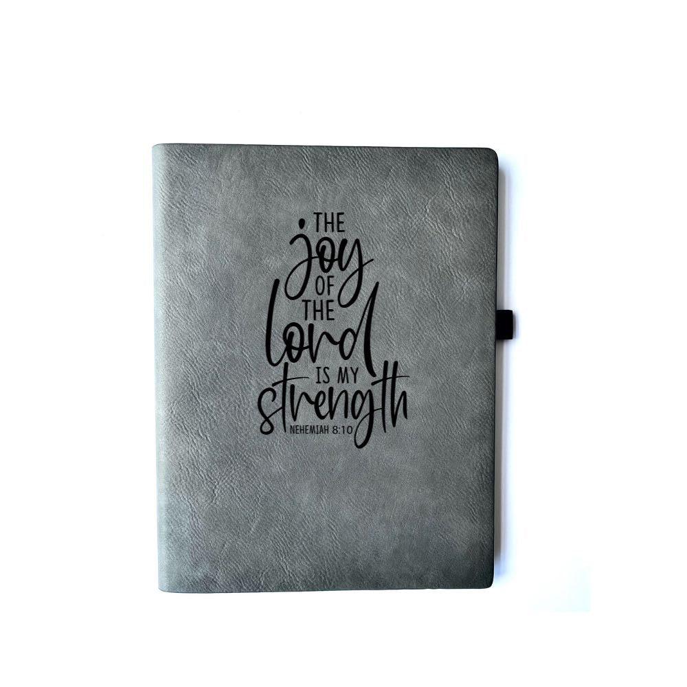 Iron Gray Faux leather journal with "Faith Can Move Mountains Matthew 17:20" engraved on it. Can be personalized with your name or business logo in the bottom right corner. There is not matching pen option with the Iron Gray Journal.