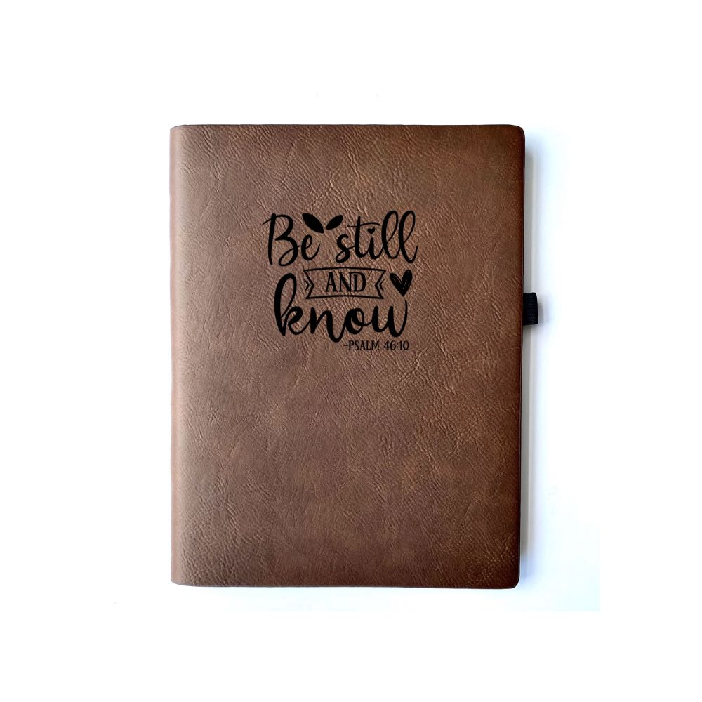 Bay Brown Faux leather journal with "BE STILL AND KNOW PSALM 46:10" engraved on it. Can be personalized with your name or business logo in the bottom right corner. A matching pen can be engraved to complete the set.