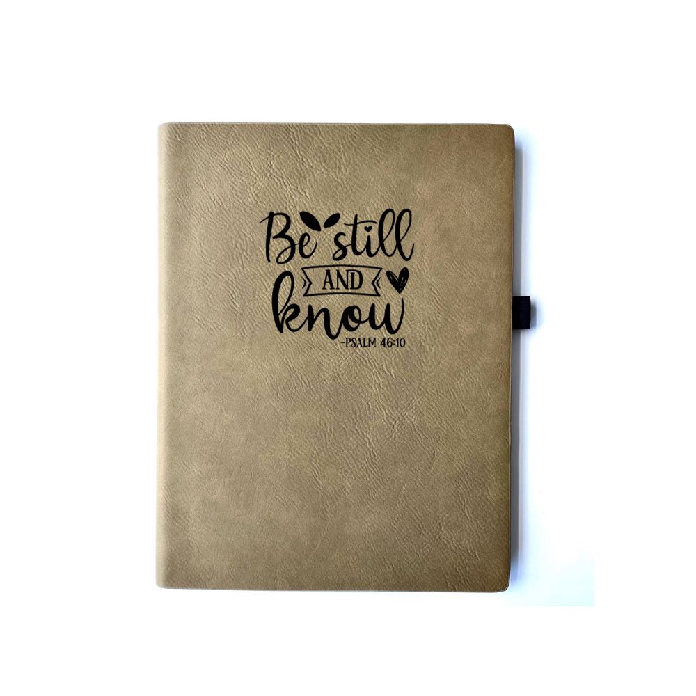 Buckskin Faux leather journal with "BE STILL AND KNOW PSALM 46:10" engraved on it. Can be personalized with your name or business logo in the bottom right corner. A matching pen can be engraved to complete the set.