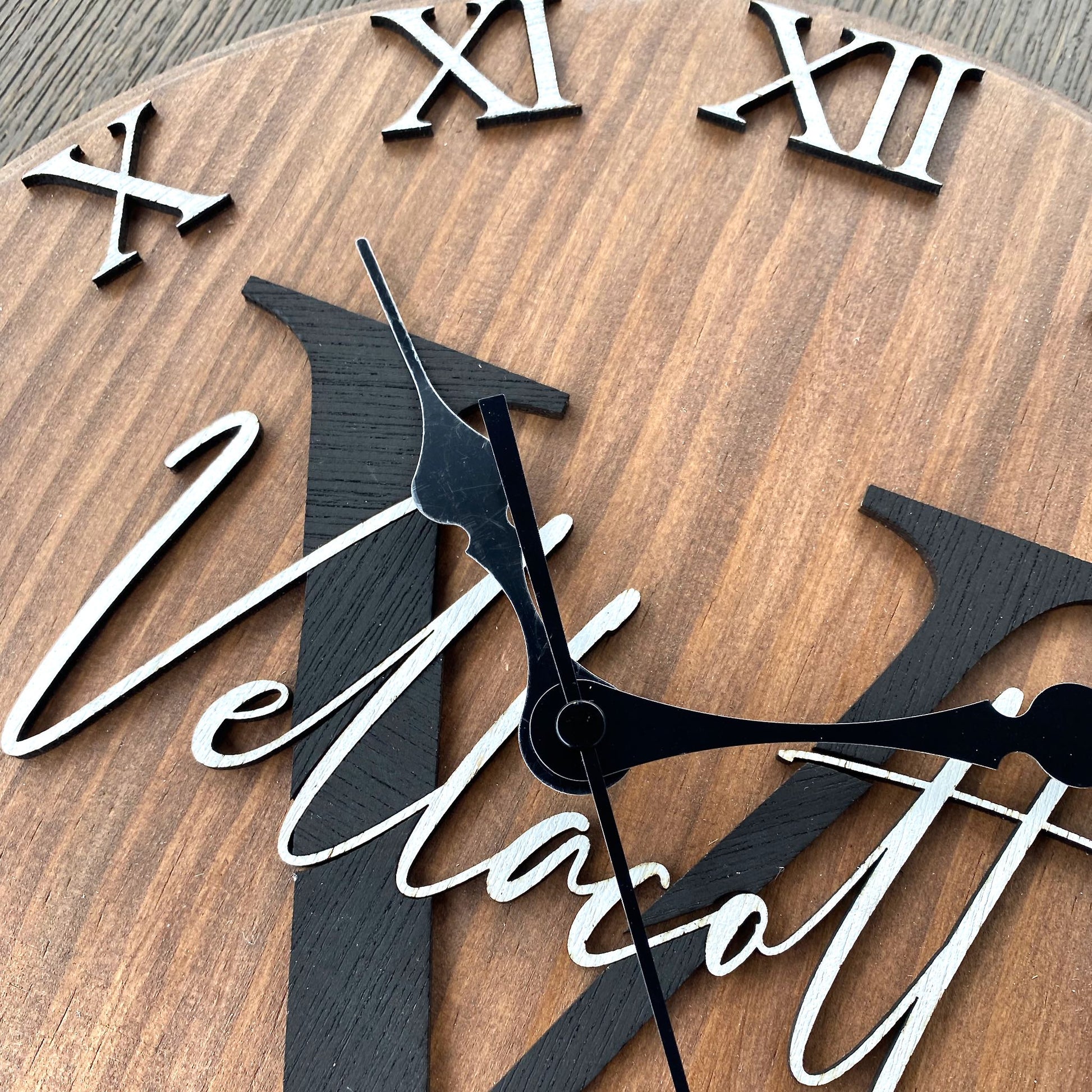 Vintage Rustic Oak Wooden 12 inch round custom Monogram name clock with surname and initial and wedding or special date. Close up details of roman numerals and quality. 